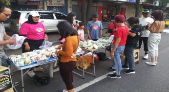 Komunitas Sosial Peduli Kasih Soloraya Bagikan Paket Sayuran di Acara CFD Kota Solo